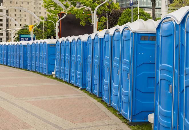 a row of portable restrooms at a fairground, offering visitors a clean and hassle-free experience in mora